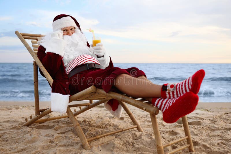 Santa Claus With Cocktail Relaxing On Beach. Stock Photo - Image of ...