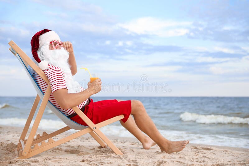 Santa Claus with Cocktail Relaxing in Chair on Beach, Space for Text ...