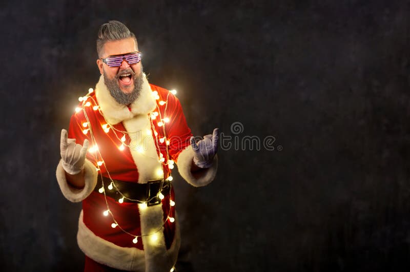 Santa Claus com festões de incandescência fotografia de stock royalty free Santa Claus com festões de incandescência fotografia de stock royalty free