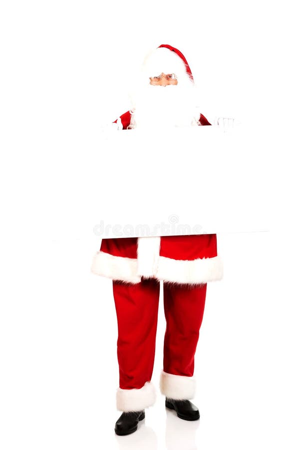 Santa Claus con l'insegna in bianco della pubblicità immagini stock Santa Claus con l'insegna in bianco della pubblicità immagini stock