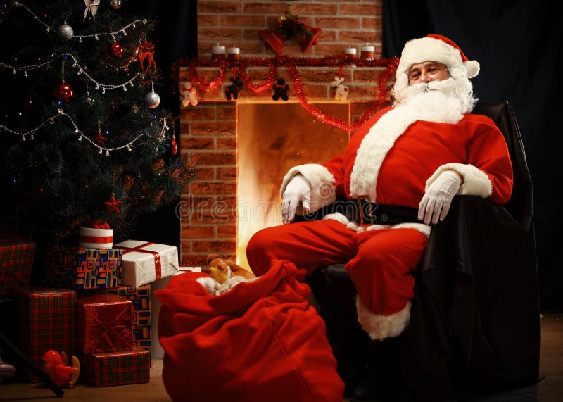 Santa Claus having a rest in a comfortable chair