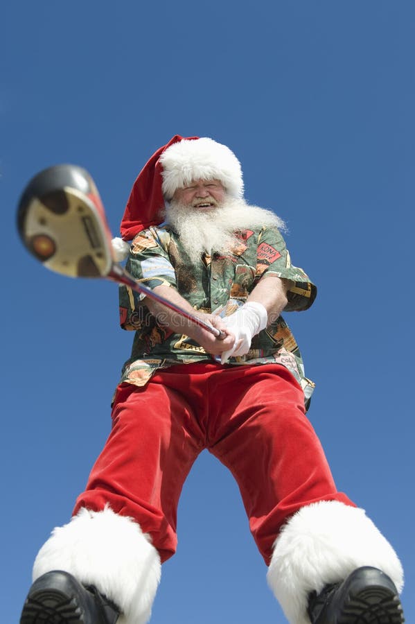 Santa Claus Holding Golf Club stock foto Santa Claus Holding Golf Club stock foto