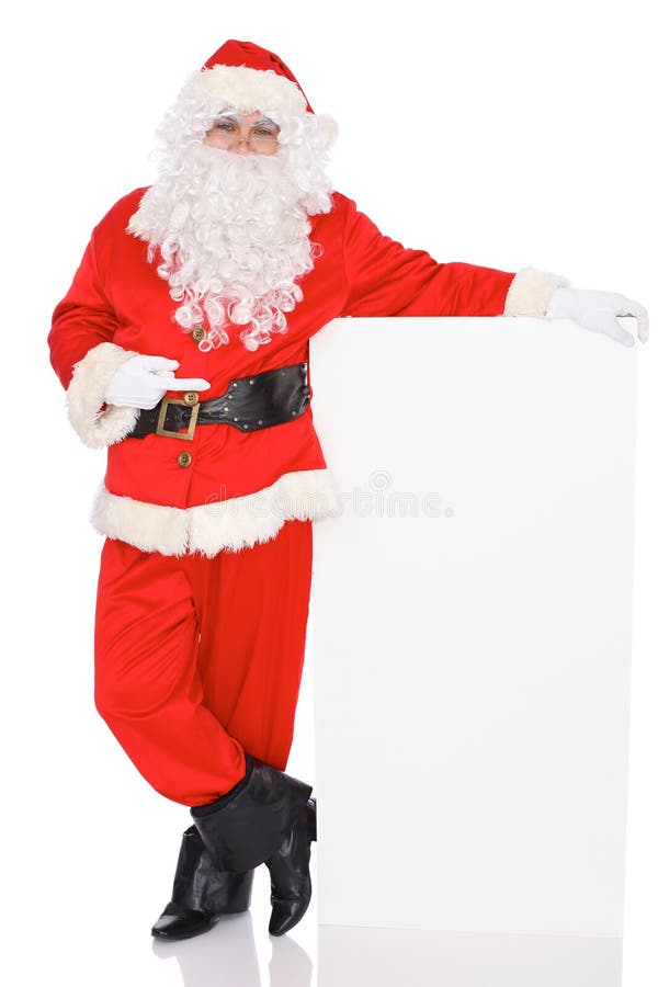 Santa Claus pointing on blank white wall, advertisement banner with copy space. on white background. Full