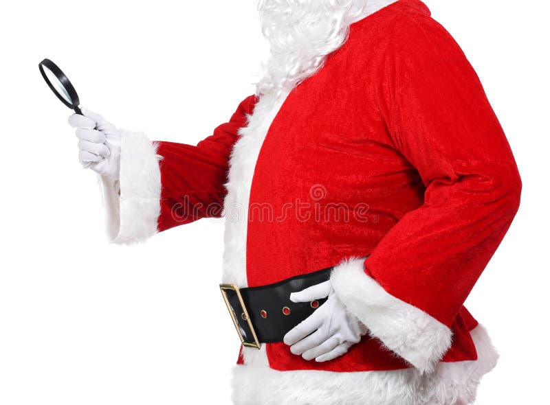 Photography of Santa Claus holding a magnifying glass. Photography of Santa Claus holding a magnifying glass