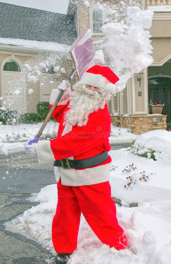 Santa Claus Shovels Snow fotografia stock