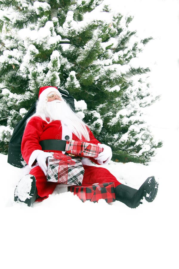 Santa Claus stanca nella neve immagini stock Santa Claus stanca nella neve immagini stock