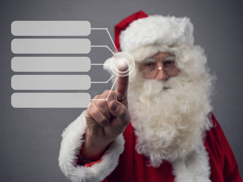 Santa Claus using an interactive touch screen user interface, technology and virtual reality concept. Futuristic virtual screen interface technology stock images, royalty-free photos and pictures