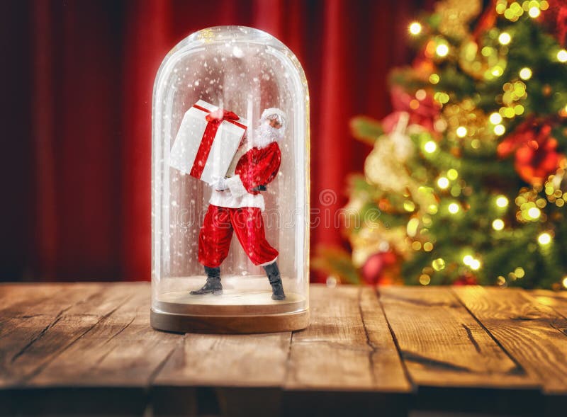 Santa dentro un globo della neve di Natale fotografia stock Santa dentro un globo della neve di Natale fotografia stock