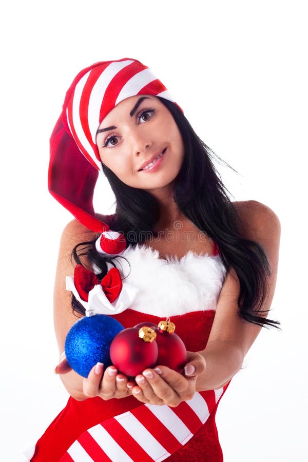 Santa girl holding a Christmas ball