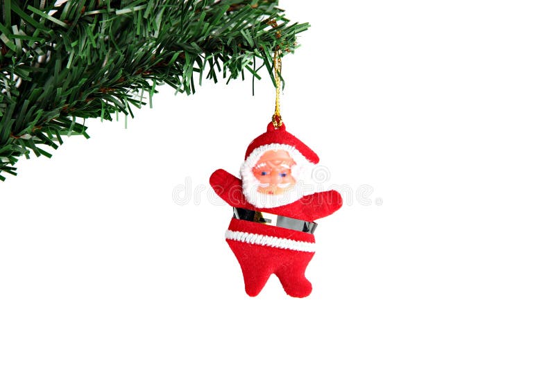 Santa hanging on branch Christmas tree.