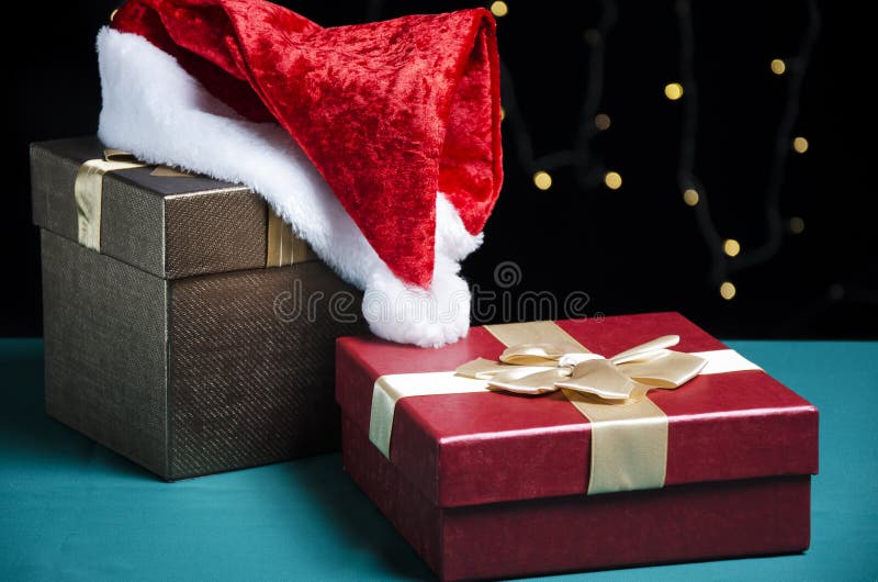 Santa hat and gift boxes stock photo. Image of christmas 27829122