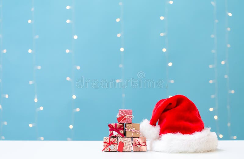 Santa Hat with Small Gift Boxes Stock Image Image of boxes, claus