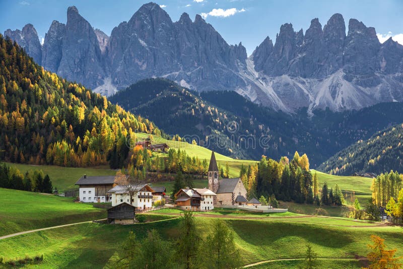 Famous best alpine place of the world, Santa Maddalena village with Dolomites mountains in background, Val di Funes valley, Trentino Alto Adige region, Italy, Europe. Famous best alpine place of the world, Santa Maddalena village with Dolomites mountains in background, Val di Funes valley, Trentino Alto Adige region, Italy, Europe