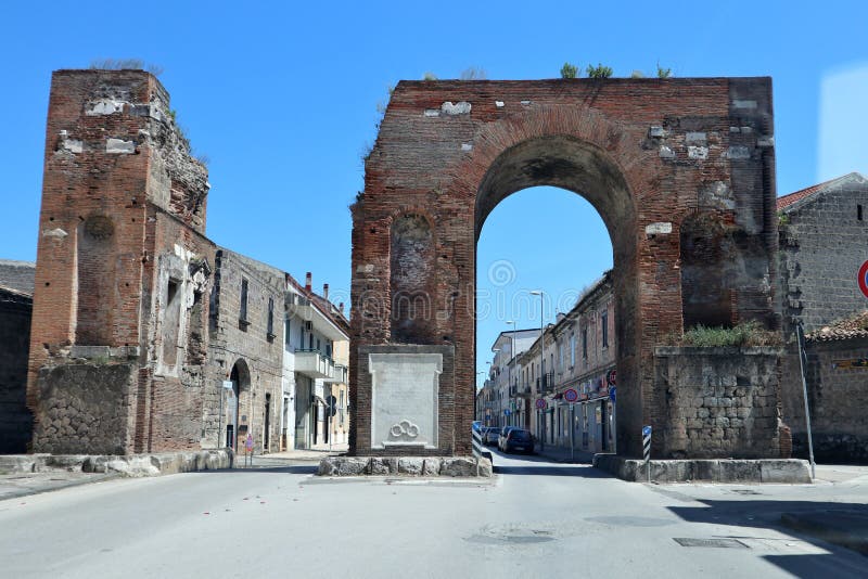 Santa Maria Capua Vetere, Campania, Italy - May 22, 2020: Arch of Hadrian, also called Arco Felice or Arches of Capua, erected in the 2nd century on the Appian Way. Santa Maria Capua Vetere, Campania, Italy - May 22, 2020: Arch of Hadrian, also called Arco Felice or Arches of Capua, erected in the 2nd century on the Appian Way