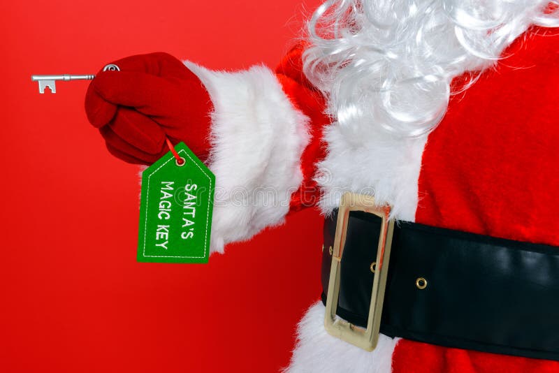Santa using his magic key stock image. Image of santa 35690257