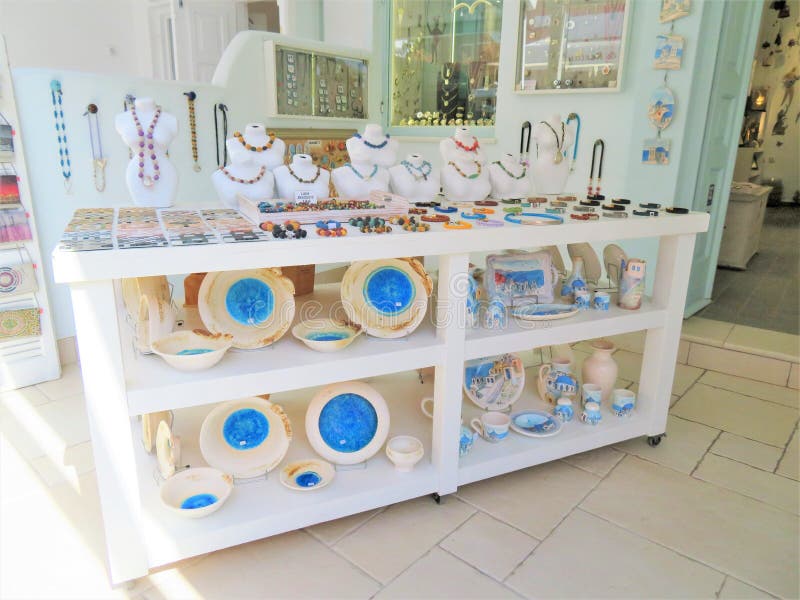 Santorini, Greece - Beautiful pottery and souvenirs for sale in a store in Santorini, Greece. Santorini, Greece - Beautiful pottery and souvenirs for sale in a store in Santorini, Greece