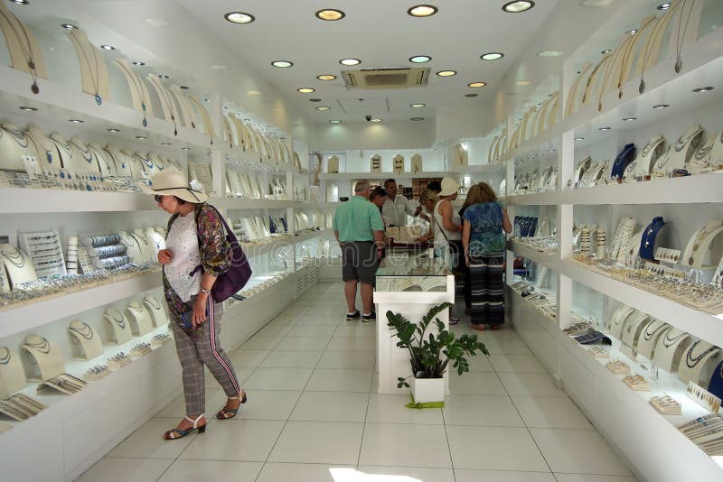 Santorini, Greece, September 21 2018, Tourists doing shopping in a jewelry store