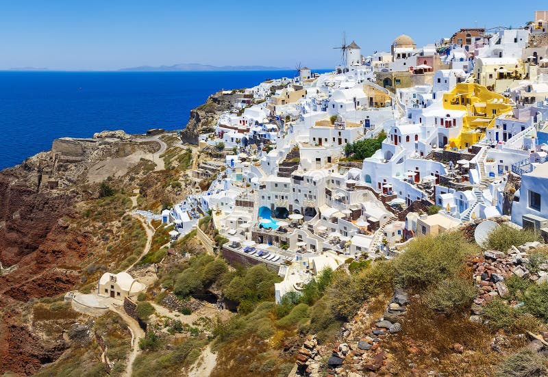 santorini της Ελλάδας Διάσημη έλξη Oia του χωριού με τον ανεμόμυλο στα ελληνικά νησιά, Αιγαίο πέλαγος στοκ φωτογραφία santorini της Ελλάδας Διάσημη έλξη Oia του χωριού με τον ανεμόμυλο στα ελληνικά νησιά, Αιγαίο πέλαγος στοκ φωτογραφία