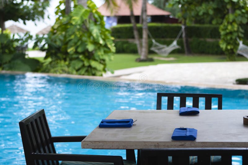 Sanya: vector de cena del poolside imágenes de archivo libres de regalías Sanya: vector de cena del poolside imágenes de archivo libres de regalías