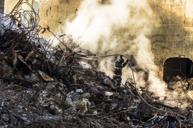 Razilian Firefighter Fights Flames in the Rubble Where a 24-story ...