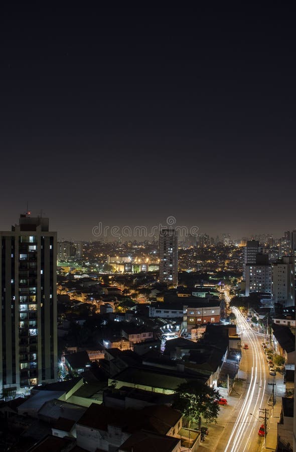 Sao Paulo is a megalopolis, with a metro area population of 20 million people. The cities landscape is overwhelmingly filled with highrise buildings. This is a typical neighborhood in Zona Sul by night. Sao Paulo is a megalopolis, with a metro area population of 20 million people. The cities landscape is overwhelmingly filled with highrise buildings. This is a typical neighborhood in Zona Sul by night.