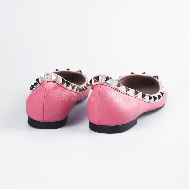 Sapatas cor-de-rosa fêmeas foto de stock