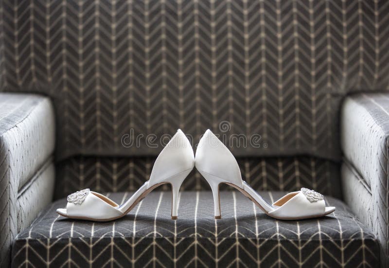 Classic wedding shoes on a neutral background. Classic wedding shoes on a neutral background.