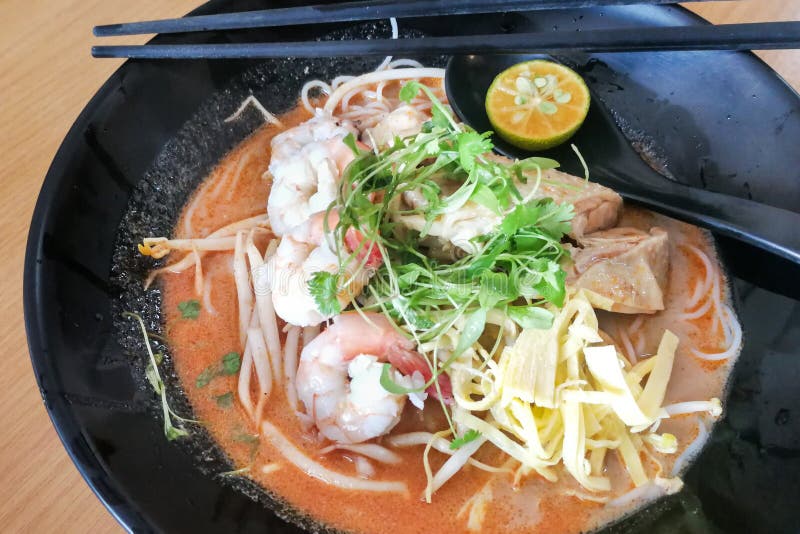 Sarawak laksa, popular food  in Kuching.  Vermicelli, spicy soup