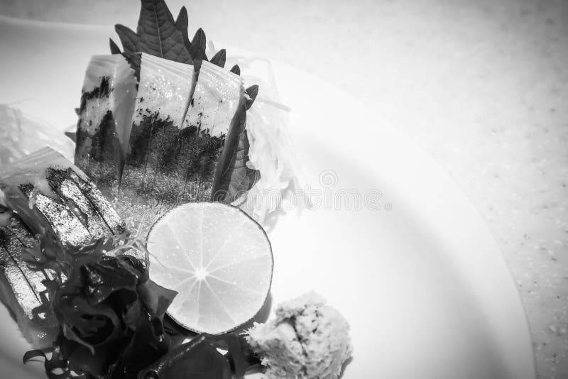 Sashimi Sliced Raw Japanese Fish Dish on Marble Table Stock Photo
