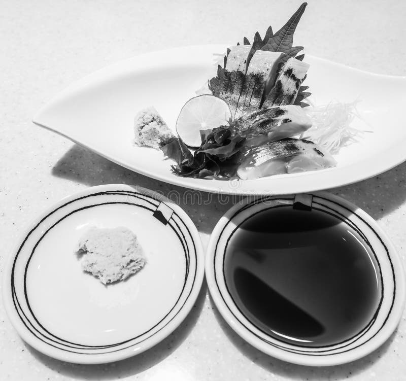 Sashimi Sliced Raw Japanese Fish Dish on Marble Table Stock Photo