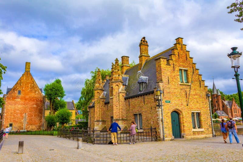 Sashuis or Sluice the Lock House on Minnerwater or Love Lake shore in Bruges old town. The Sashuis was built in 1519 as a functional sluice or lock which is used for the purpose of water management and water level control inside the canals flowing through Brugge.Bruges is the capital and largest city of the province of West Flanders in the Flemish Region of Belgium,August 7th 2016. Sashuis or Sluice the Lock House on Minnerwater or Love Lake shore in Bruges old town. The Sashuis was built in 1519 as a functional sluice or lock which is used for the purpose of water management and water level control inside the canals flowing through Brugge.Bruges is the capital and largest city of the province of West Flanders in the Flemish Region of Belgium,August 7th 2016