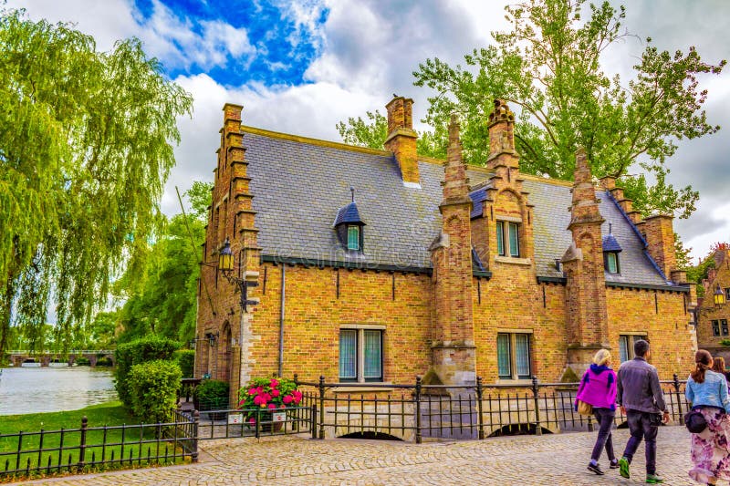 Sashuis or the Lock House on Minnerwater or Love Lake shore in Bruges old town. The Sashuis was built in 1519 as a functional sluice or lock which is used for the purpose of water management and water level control inside the canals flowing through Brugge.Bruges is the capital and largest city of the province of West Flanders in the Flemish Region of Belgium,August 7th 2016. Sashuis or the Lock House on Minnerwater or Love Lake shore in Bruges old town. The Sashuis was built in 1519 as a functional sluice or lock which is used for the purpose of water management and water level control inside the canals flowing through Brugge.Bruges is the capital and largest city of the province of West Flanders in the Flemish Region of Belgium,August 7th 2016