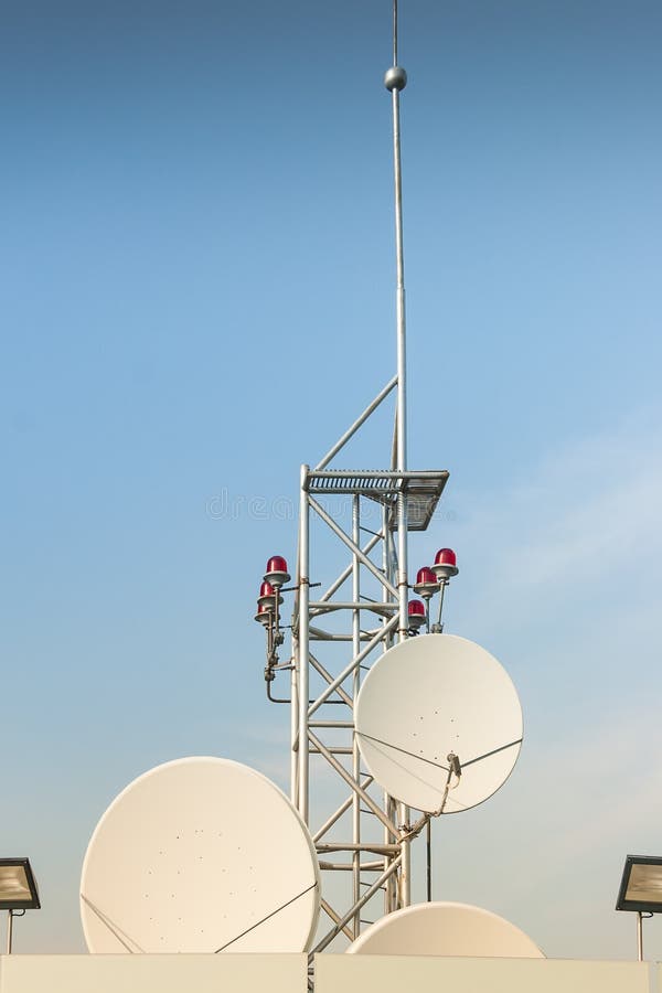 Satellite antenna on roof stock photo. Image of broadcasting 43530546