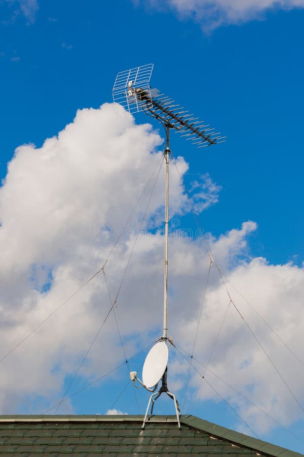 Satellite Dish and Antenna TV on Blue Sky. royalty free stock photography Satellite Dish and Antenna TV on Blue Sky. royalty free stock photography