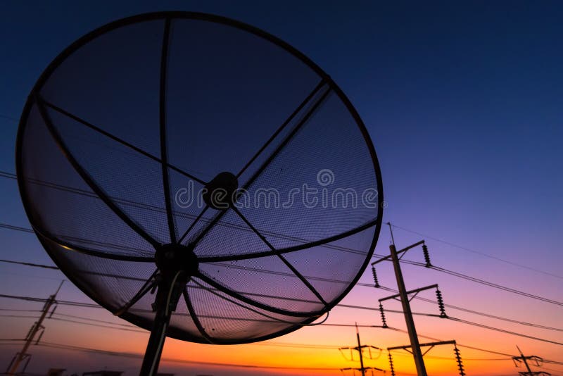 Satellite Dish on the Roof of a Wooden House.Satellite Dish is a Device