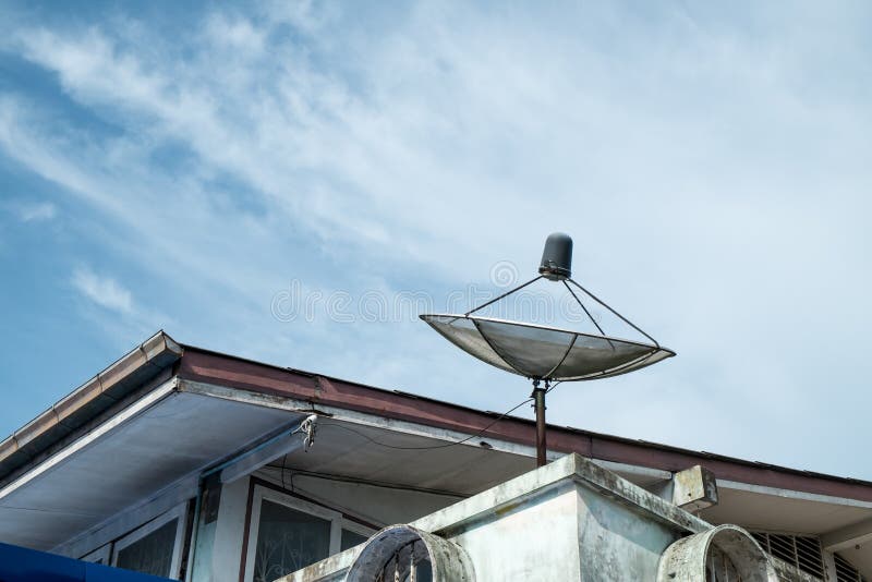 Satellite on roof house stock image. Image of antenna 23098403