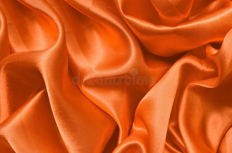 Satin orange de texture, fond en soie photographie stock libre de droits Satin orange de texture, fond en soie photographie stock libre de droits