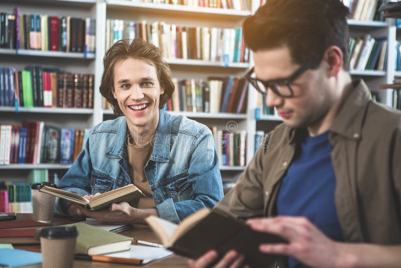 Satisfied Friends Studying in Library Stock Photo Image of library