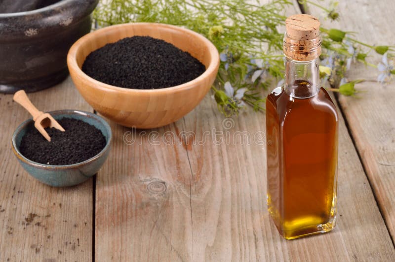 Sativaöl Nigella lizenzfreies stockbild