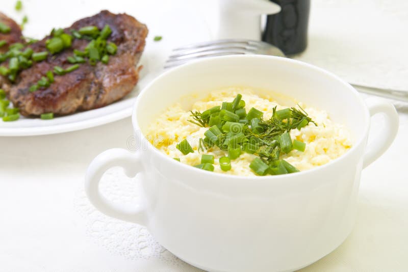 Sauce and grilled steak herbs in white plate