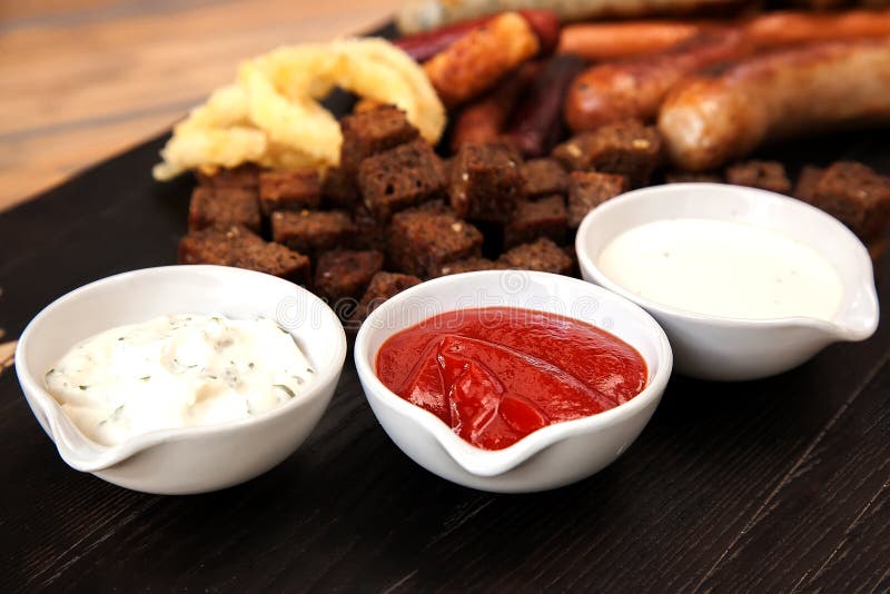 Sauces To Assorted Grill. European Cuisine Stock Photo Image of plate