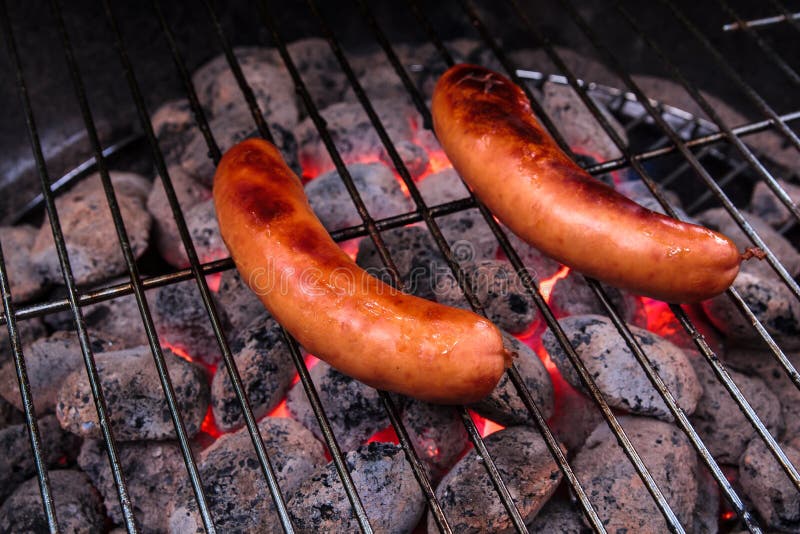 Sausage barbecuing stock photo. Image of barbecuing, ashes 25708254