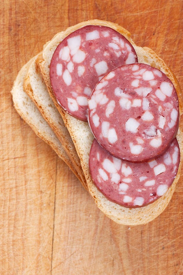 Sausage on a bread stock image. Image of group, eating 19084457
