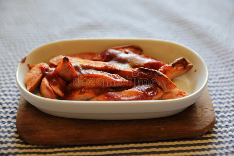 Sausage with Curry Sauce Currywurst ,German Food Stock Photo Image of pieces, meat 142566360