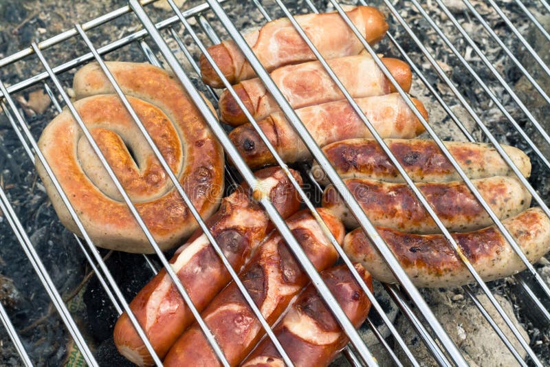 Sausage and Hot Dogs Grilling Outdoors Stock Image Image of grilled