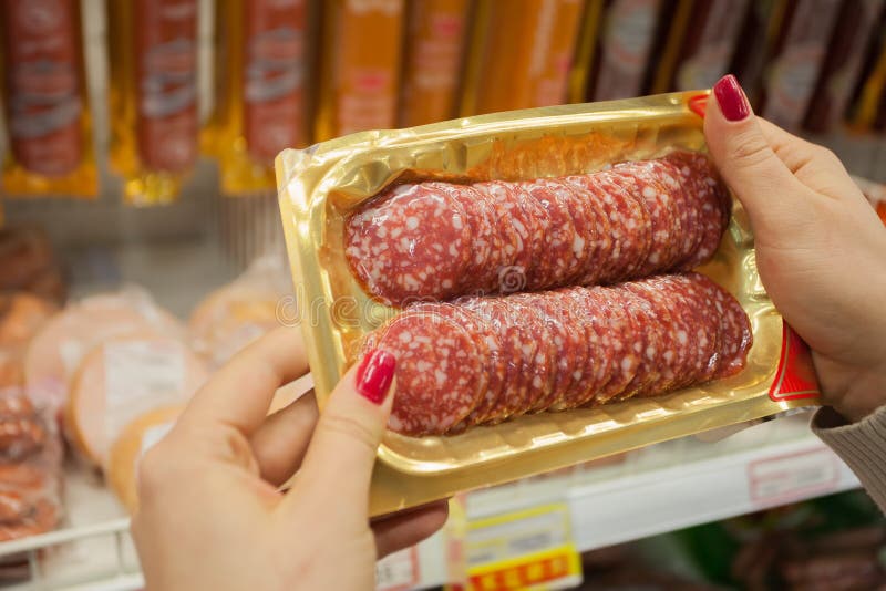 Salami in a plastic bag stock photo. Image of prepared 20333288