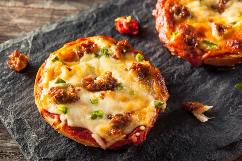 Sausage and Pepper Pizza Bagels Stock Image Image of parmesan, herb