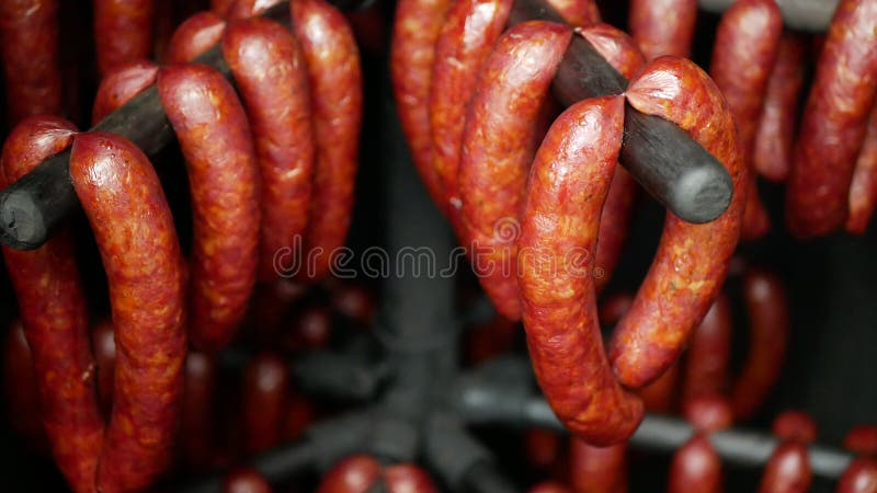 Sausage red smokehouse smoked on beech wood pig slaughter traditional Czech household hangs, sausage-meat, smoked meat