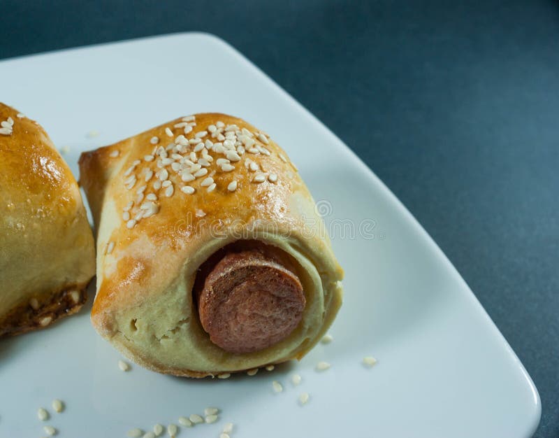 Sausage Roll in the Dough on a White Plate Stock Photo Image of beef