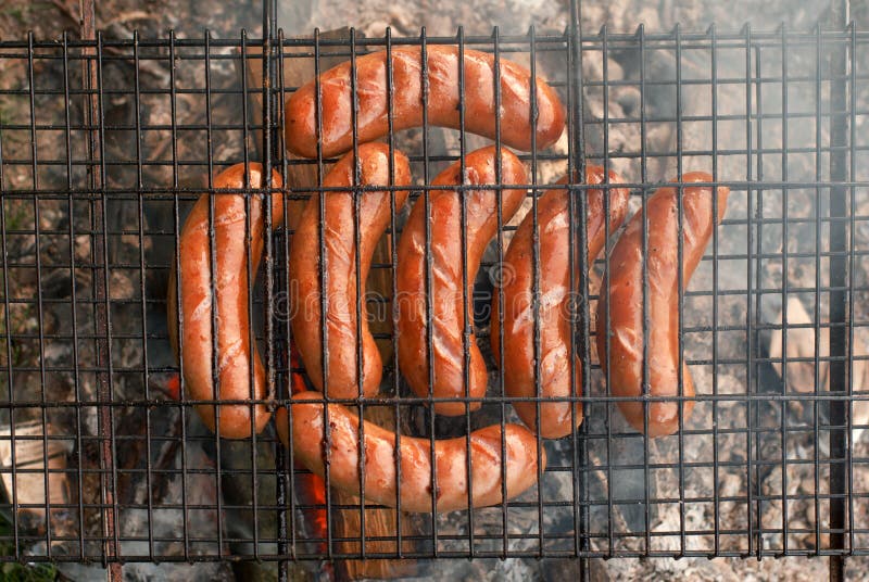 Sausages on BBQ royalty free stock images Sausages on BBQ royalty free stock images